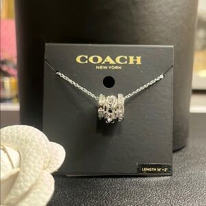 COACH Silver Necklace with Ring Pendants